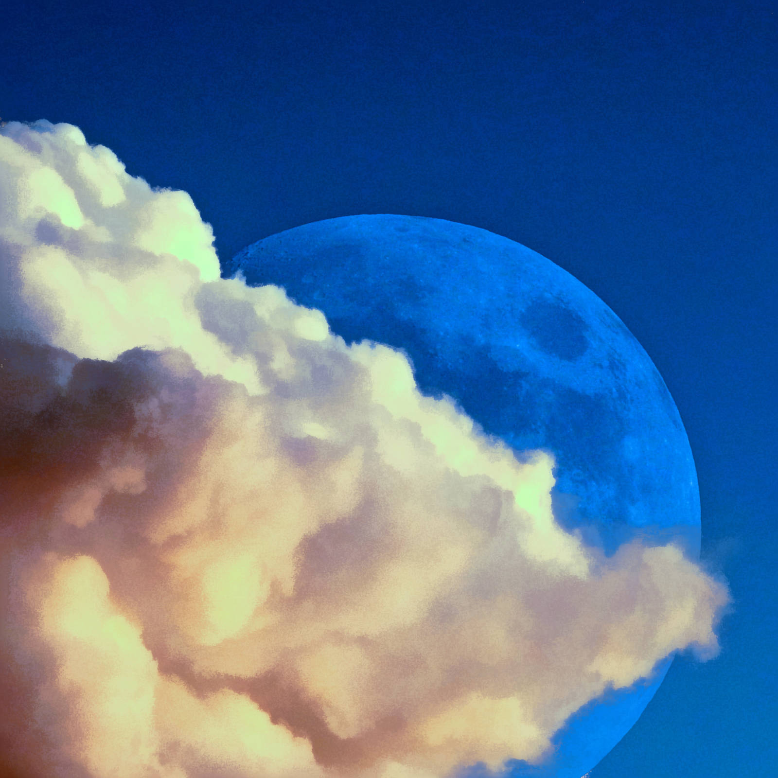 The moon behind a cloud